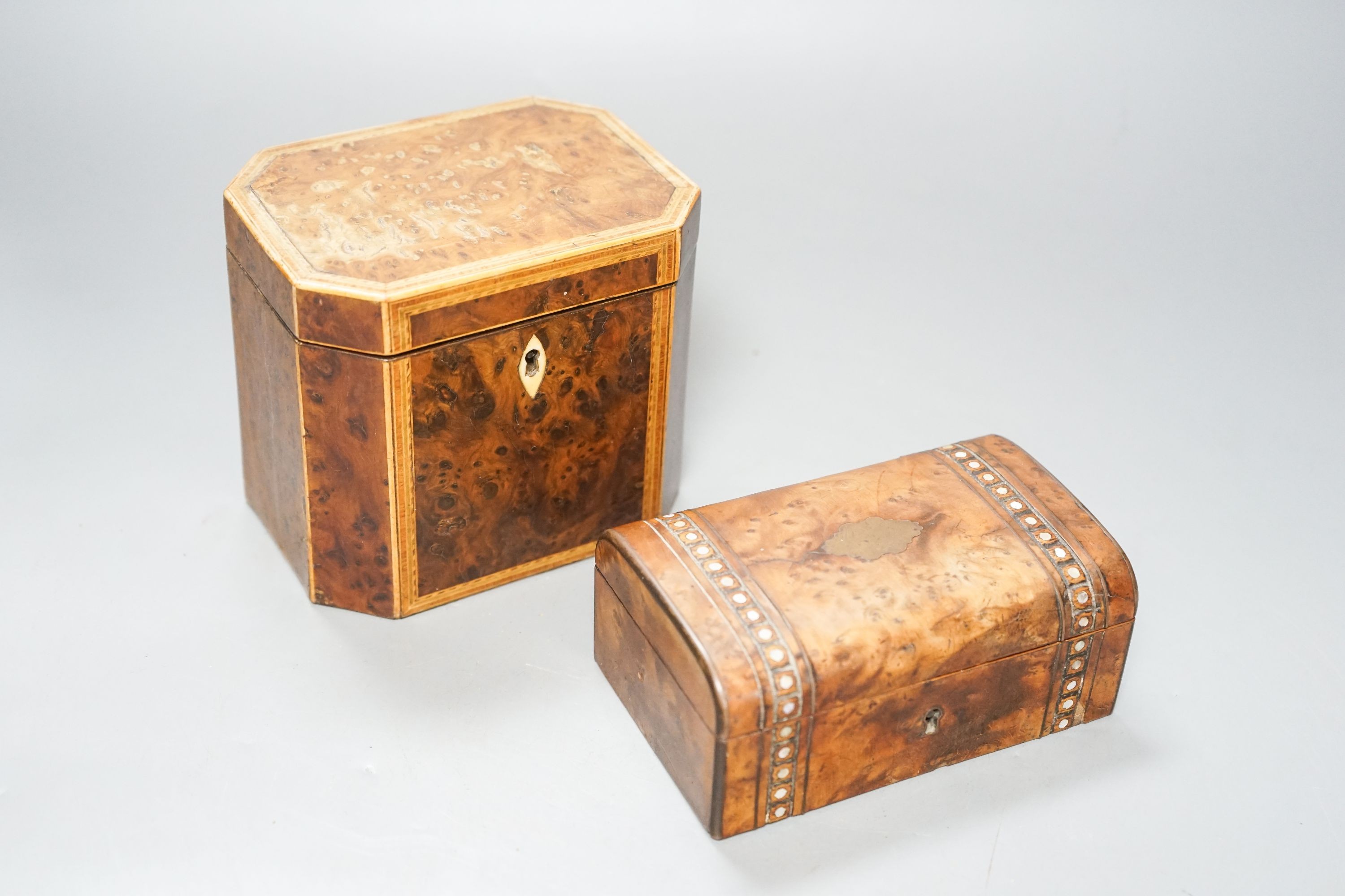 A George III burr yew and harewood, tulipwood and boxwood strung tea caddy, of octagonal form, 12.5cm and a small French yew jewellery casket